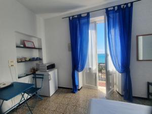 Voodi või voodid majutusasutuse Hotel Zoagli toas