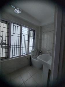 חדר רחצה ב-Om Bramha Hotel