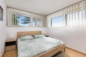 Un pat sau paturi într-o cameră la Gerlitzenzeit