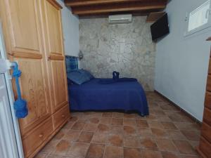 A bed or beds in a room at Casa marinera en la Orilla del mar