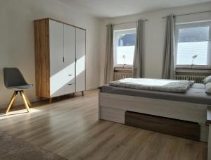 Postel nebo postele na pokoji v ubytování Nordlicht Emden