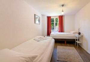 Postel nebo postele na pokoji v ubytování Chalet Des Alpes
