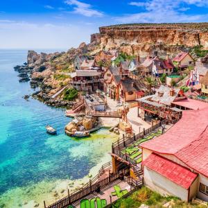 a village on the coast of the amalfi coast at Panoramic Penthouse Haven in Mellieħa
