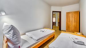 Posteľ alebo postele v izbe v ubytovaní Apartament Angelika B1 - 5D Apartamenty