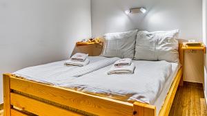 Posteľ alebo postele v izbe v ubytovaní Apartament Angelika B1 - 5D Apartamenty