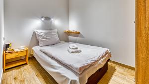 Posteľ alebo postele v izbe v ubytovaní Apartament Angelika B1 - 5D Apartamenty