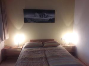 Posteľ alebo postele v izbe v ubytovaní Ferienwohnung auf der sonnigen Südseite