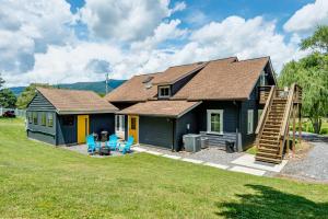 a small house with a staircase in front of it at Old Lytle Cove Rd - Upper Unit in Swannanoa