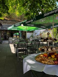 a table with a plate of food on it at Zum Goldenen Fass in Nassau