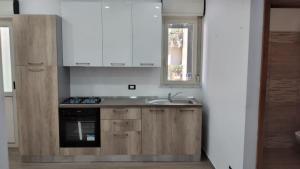 A kitchen or kitchenette at Casa Vacanze da Peppe