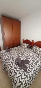 Postel nebo postele na pokoji v ubytování Apartamento El Cercado Mogan + 17 fotografií