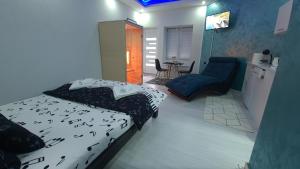 Ένα ή περισσότερα κρεβάτια σε δωμάτιο στο Apartman Melody
