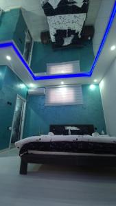 Ένα ή περισσότερα κρεβάτια σε δωμάτιο στο Apartman Melody