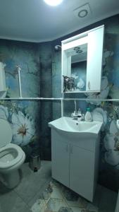 Ένα μπάνιο στο Apartman Melody