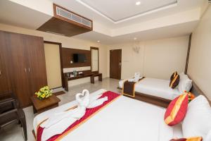 KK Comforts客房内的一张或多张床位