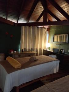 Cama ou camas em um quarto em Hiu Hotel