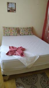 Ένα ή περισσότερα κρεβάτια σε δωμάτιο στο Alojamiento Wilkenia