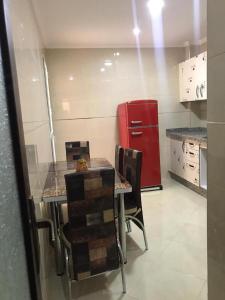 Kuchyň nebo kuchyňský kout v ubytování اقامة السعادة