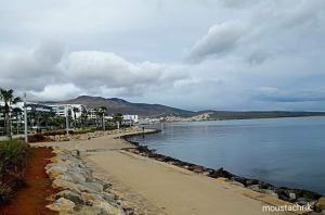 a beach next to a body of water at اقامة السعادة in Nador