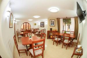 TV a/nebo společenská místnost v ubytování Astorga Hotel Arequipa