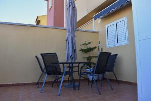 Balkón nebo terasa v ubytování Duplex en Meloneras