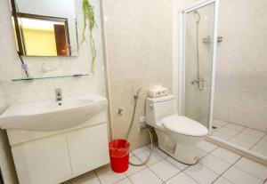 Koupelna v ubytování Lucky Star Homestay