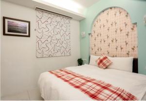 Postel nebo postele na pokoji v ubytování Lucky Star Homestay