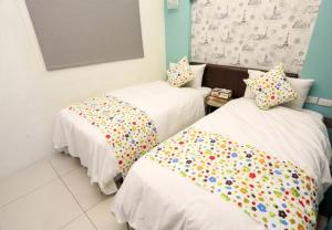 Postel nebo postele na pokoji v ubytování Lucky Star Homestay