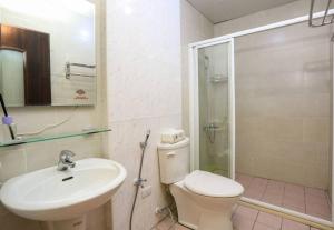Koupelna v ubytování Lucky Star Homestay