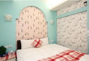 Postel nebo postele na pokoji v ubytování Lucky Star Homestay