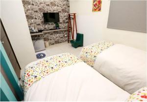 Postel nebo postele na pokoji v ubytování Lucky Star Homestay