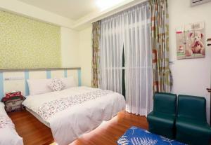 Postel nebo postele na pokoji v ubytování Lucky Star Homestay