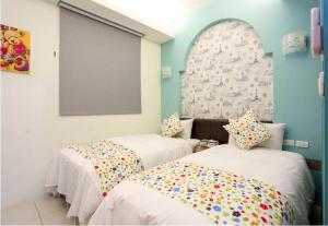 Postel nebo postele na pokoji v ubytování Lucky Star Homestay