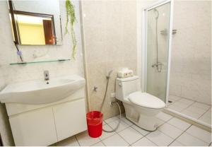 Koupelna v ubytování Lucky Star Homestay