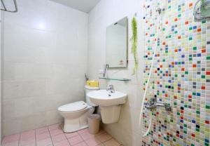 Koupelna v ubytování Lucky Star Homestay