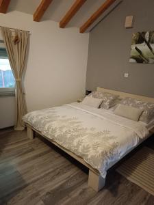 Postel nebo postele na pokoji v ubytování Apartment King