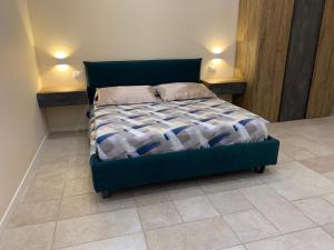 Postel nebo postele na pokoji v ubytování B&B Mercadante