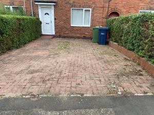 a brick driveway in front of a brick house at Montrose - Perfect contractor stay, own driveway, 3 bedrooms in Gateshead