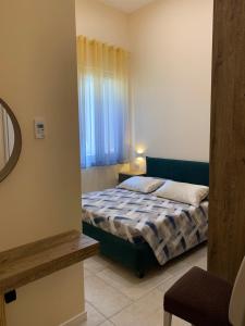 Postel nebo postele na pokoji v ubytování B&B Mercadante