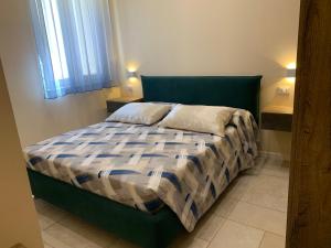 Postel nebo postele na pokoji v ubytování B&B Mercadante