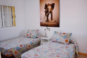 Postel nebo postele na pokoji v ubytování Duplex en Meloneras + 31 fotografií