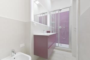 Ein Badezimmer in der Unterkunft Milleventi Apartments Bologna