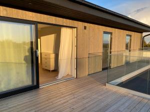 Balkón nebo terasa v ubytování Hus nära havet i Olofsbo