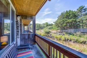 a view from the porch of a house at Creekside Condo 136 - Meredith Lodging in Neskowin