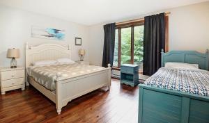 Katil atau katil-katil dalam bilik di Chalets Alpins -41 Chemin des Skieurs +26 gambar