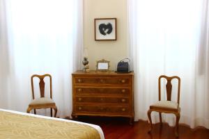 Postel nebo postele na pokoji v ubytování Casa Côrte Real