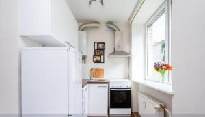 Kuchyň nebo kuchyňský kout v ubytování One bedroom apartment
