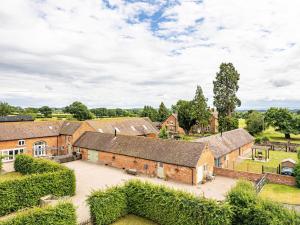 an aerial view of the barns at the property at The Dairy - Uk10957 in Burlton