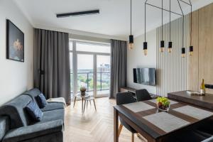 Posedenie v ubytovaní P&O Apartments Rydygiera II