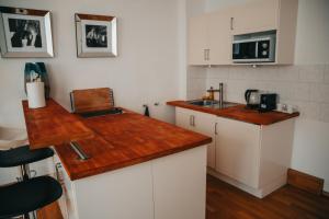Kjøkken eller kjøkkenkrok på Jalda Apartments